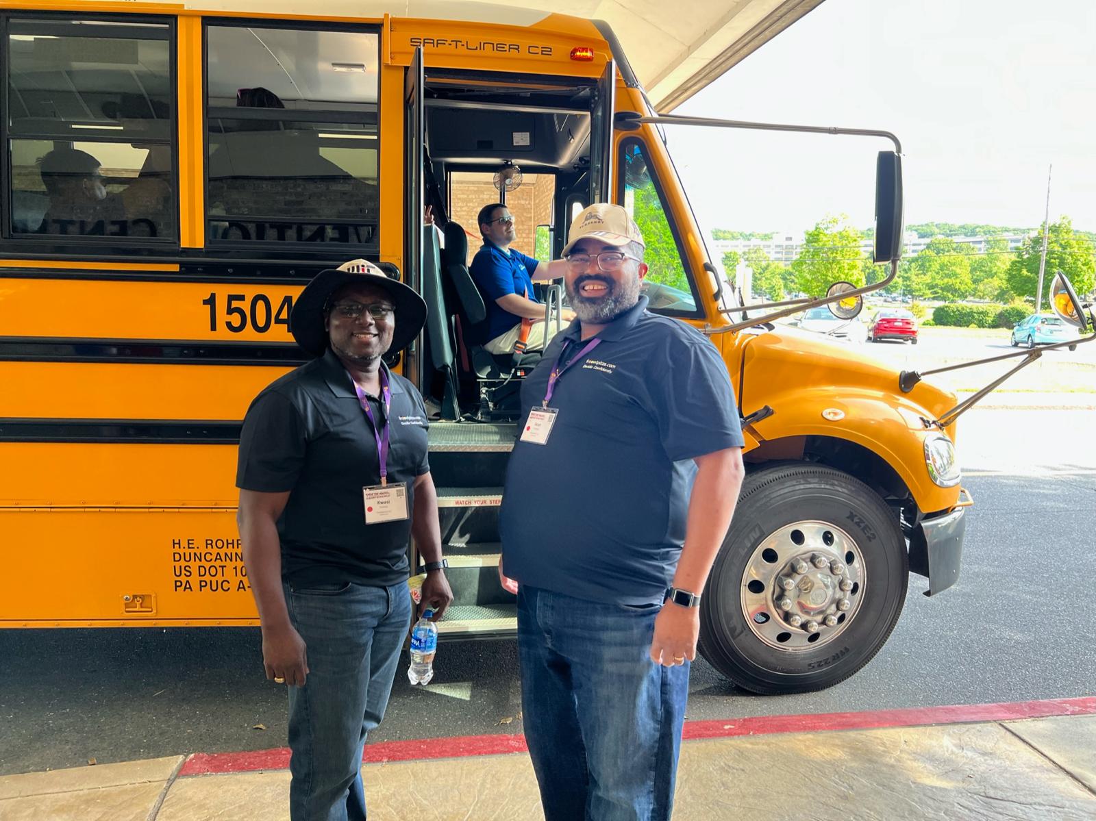 Students with bus and chaperones